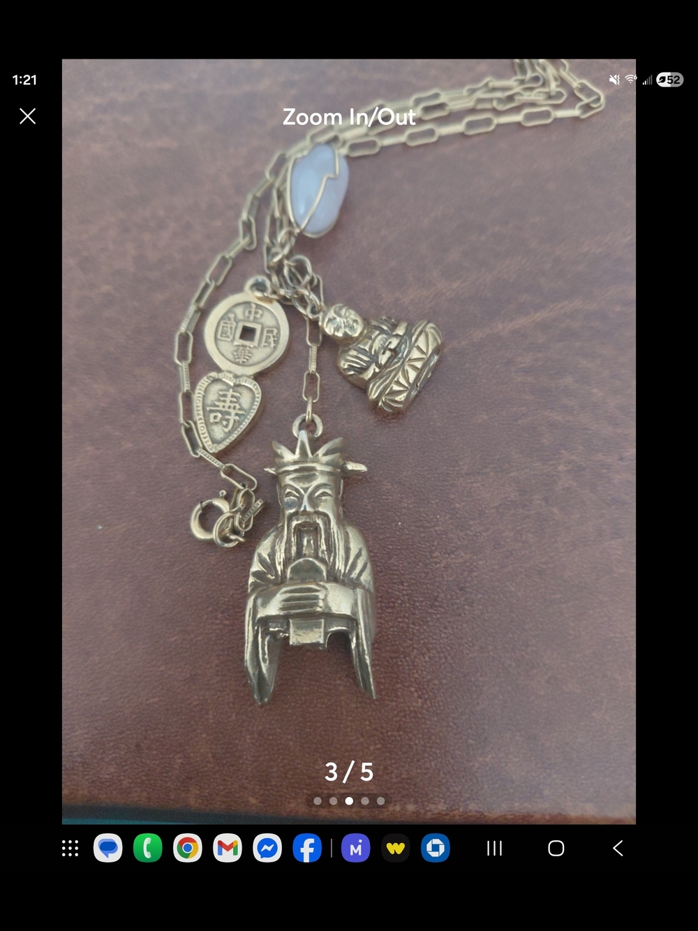 vintage charm necklace featuring Asian-inspired figural pendants